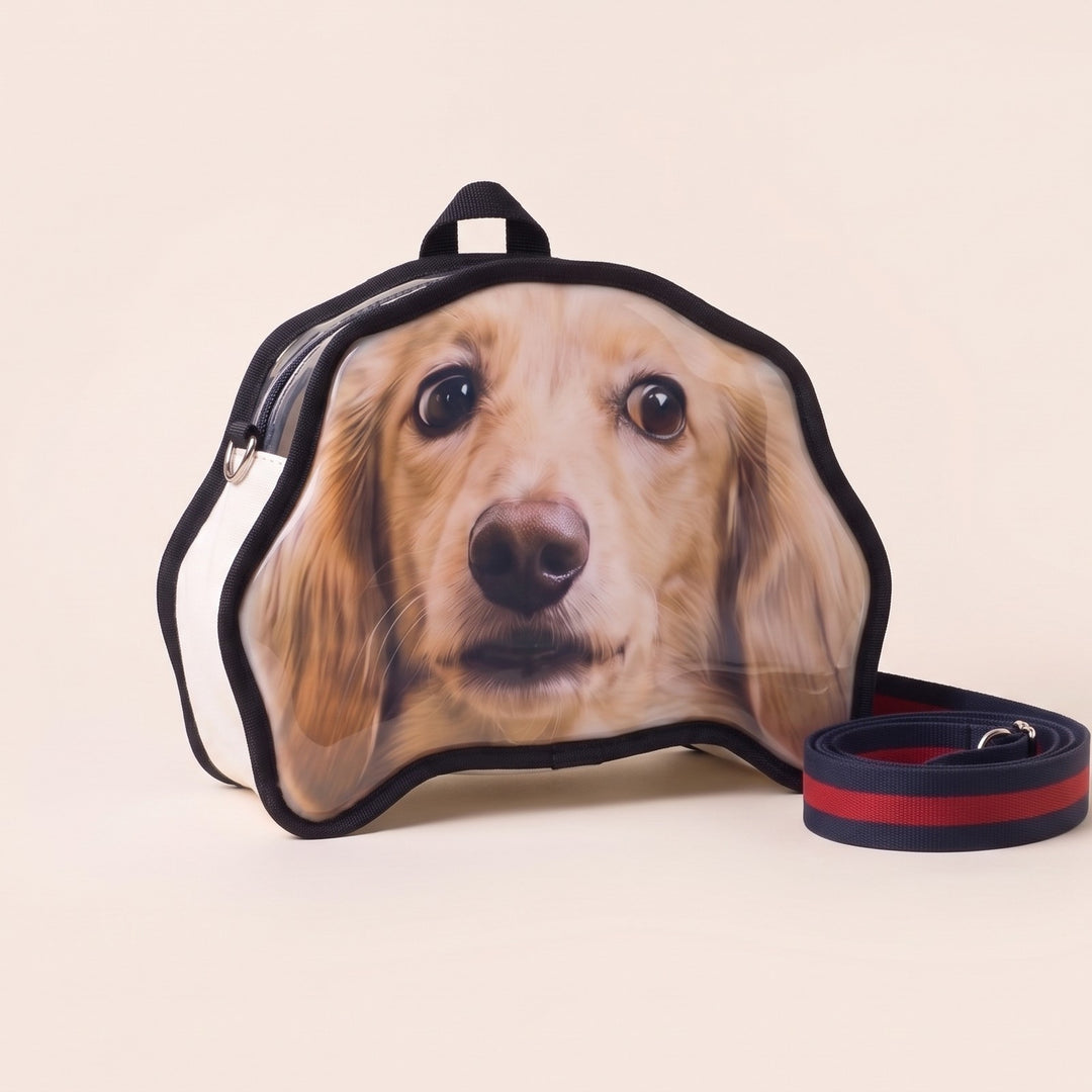The crossbody bag cut to the dog's head shape on a plain background